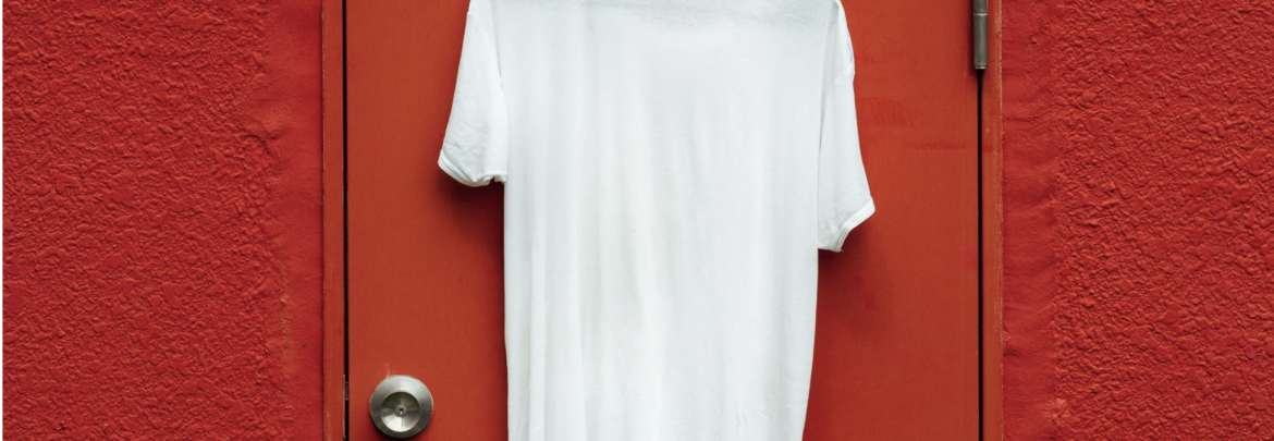 White T-shirt on Red Door against red wall