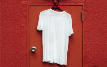 White T-shirt on Red Door against red wall